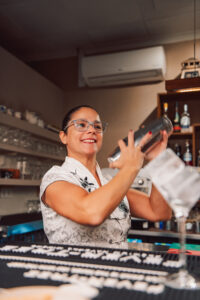 A cocktail being mixed in a cocktail shaker at Criollo Restaurant